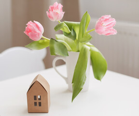 spring still life with fresh pink tulips, home decor.