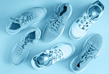 Many blue pair of sport shoes top view