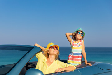 Happy family travel by car on summer vacation