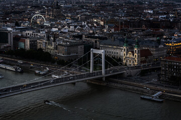 View of the eastern part of the city of Budapest and the Erzsebet bridge from Gellert mountain, Hungary late at night.