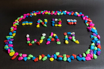 Phrase no war with the flags of russia and ukraine designed with multi-colored stones.
