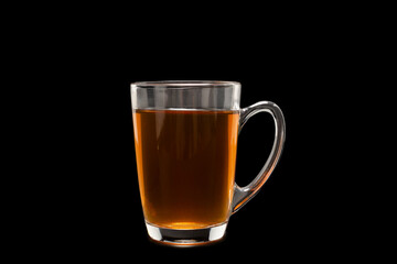 A turkish glass of tea on black background.