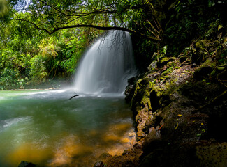 Fototapeta na wymiar Long exposure view of a hidden waterfall located in Mauritius 