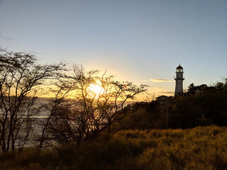 Sunset over the ocean and Diamond Head Lighthouse on Oahu