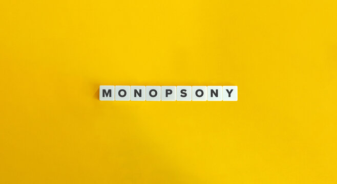 Monopsony Word on Letter Tiles on Yellow Background. Minimal Aesthetics.