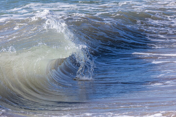 Wave breaking on the sea.