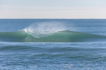 Wave breaking on the sea.