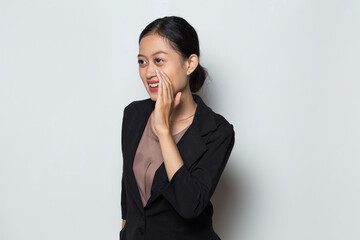 Fototapeta na wymiar Asian business woman shouting and yelling announcing 
