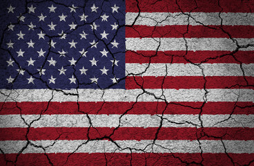 US American flag painted on a cracked concrete wall - 490129010