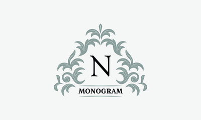 Monogram N. Luxurious floral logo with calligraphic elegant ornament lines. Business sign, identity for restaurant, boutique, cafe, hotel, heraldic, fashion and other vector illustrations