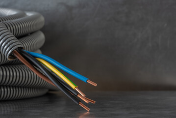 Electric Cable with Corrugated Conduit Pipe Close-up