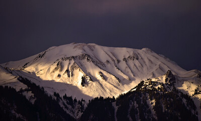 Snow mountain with sun light
