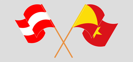 Crossed and waving flags of Austria and Tigray