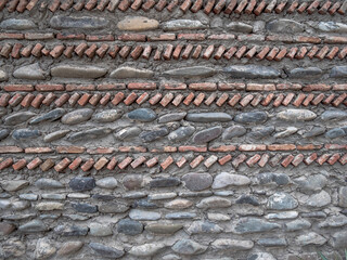 wall background with bricks and stones