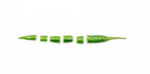 green chili pepper slices isolated on white background top view