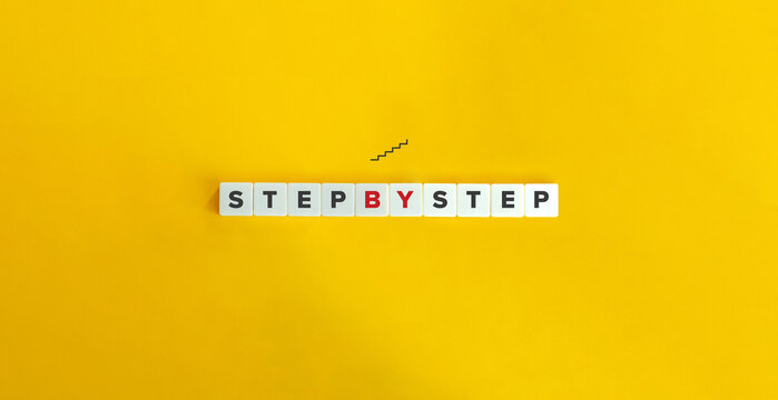Step by Step Phrase on Letter Tiles on Yellow Background. Minimal Aesthetics.