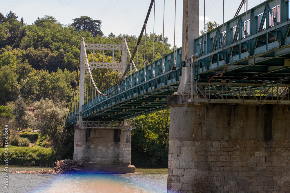 Wall mural Auvillar suspension bridge over the river Garonne in Auvillar, France