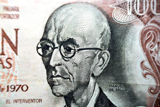 A portrait of the Spanish composer Manuel de Falla from obverse side of 100 one hundred Spanish cien Pesetas banknote currency issued 1970 by bank of Spain Madrid, old Spanish money, vintage retro