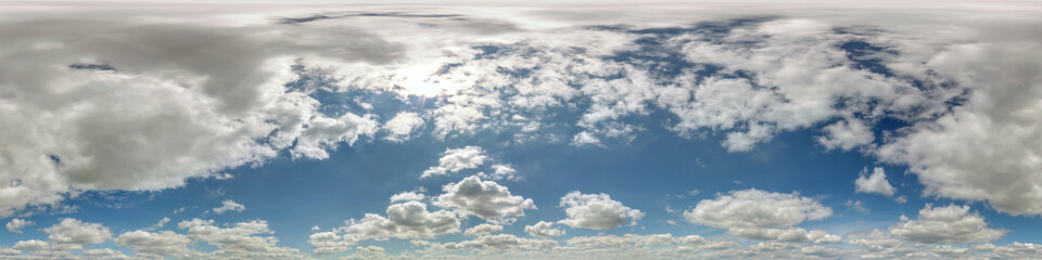 blue sky hdr 360 panorama with white beautiful clouds in seamless projection with zenith for use in 3d graphics or game development as sky dome or edit drone shot for sky replacement