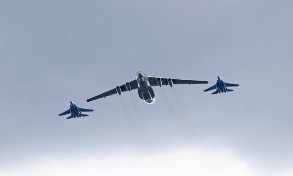 Kyiv, Ukraine - August 24, 2021: Ukrainian Air Force Ilyushin Il-76 Candid (in Center) and two Su-27 Flanker planes in the sky over Kyiv during the Ukraine Independence Day Parade