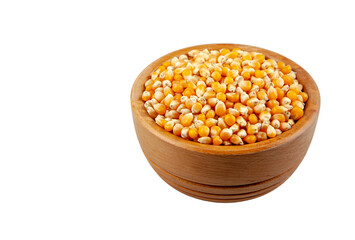 Dry corn seeds in wooden bowl,top view	