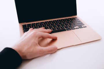 hand close-up on laptop keyboard