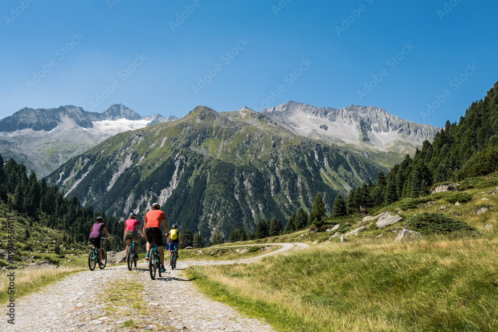 Sticker Shot of hikers on the way of mountains in Tyrol, Austria