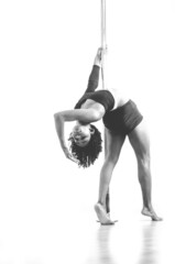 pole dance black girl in bikini posing, black and white photo