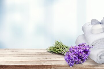 Home wardrobe with clothes and dried lavender for protection from moth.