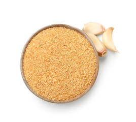 Bowl of dried garlic isolated on white background
