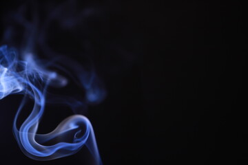 SMOKE IN LIGHT. SMOG ON BLACK BACKGROUND - 490160204