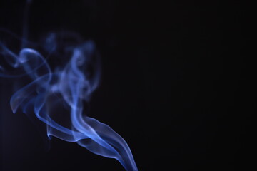 SMOKE IN LIGHT. SMOG ON BLACK BACKGROUND - 490160206