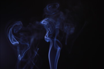 SMOKE IN LIGHT. SMOG ON BLACK BACKGROUND - 490160210