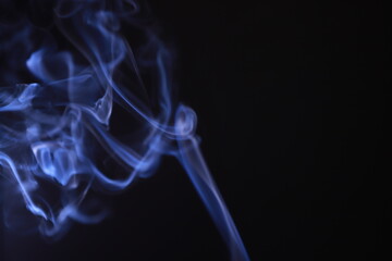 SMOKE IN LIGHT. SMOG ON BLACK BACKGROUND - 490160211