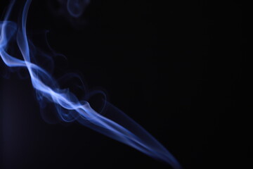 SMOKE IN LIGHT. SMOG ON BLACK BACKGROUND - 490160212
