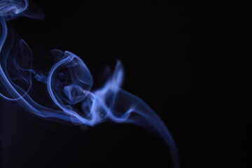 SMOKE IN LIGHT. SMOG ON BLACK BACKGROUND - 490160215