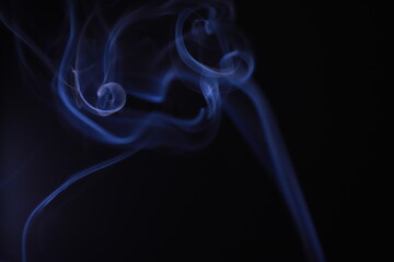 SMOKE IN LIGHT. SMOG ON BLACK BACKGROUND - 490160218