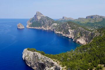 Panoramic view of high cliffs and deep blue sea at Cap de Formentor. Majorca, Spain.