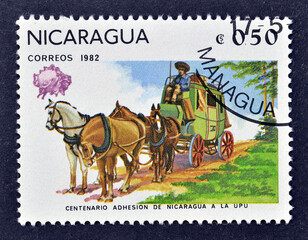 Cancelled postage stamp printed by Nicaragua, that shows Stagecoach, U.P.U. (Universal Postal...
