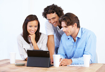 Obraz premium Connectivity makes conference calls possible. Three entrepreneurs holding a conference call with a laptop.