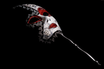 venetian carnival mask on black background