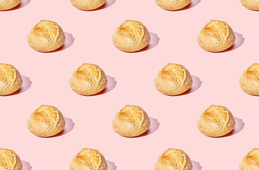 Pattern of buns on pink pastel background