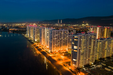 Fototapeta na wymiar Residential area, high-rises at night, drone view