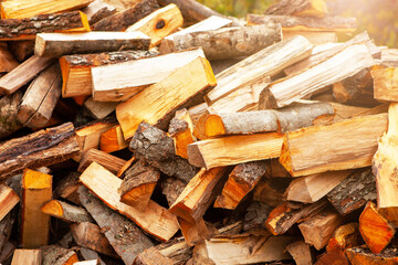 Background in the form of firewood chopped for heating the house.