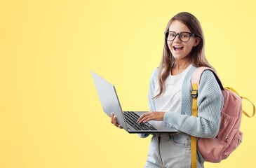 Naklejka premium E-Learning. Happy School Girl Using Digital Tablet Doing Homework Online