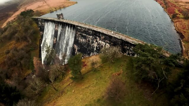 Aerial Fpv view of Grwyne Fawr Reservoir during winter months based in south wales black moutains