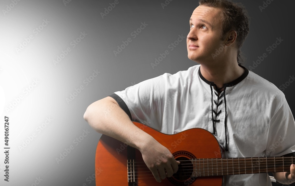 Sticker guitarist male hands playing the guitar. classical concert, performance, show.