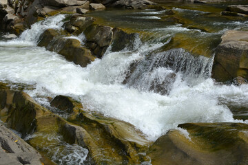 Stormy mountain current. River landscape