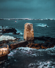 rock at the middle of the ocean 
