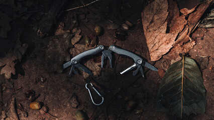Top view of leatherman multitool on the ground